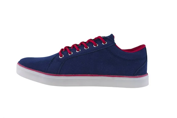 运动鞋 白色背景的运动鞋侧视图 蓝色鞋与白色鞋底和红色蕾丝 — 图库照片