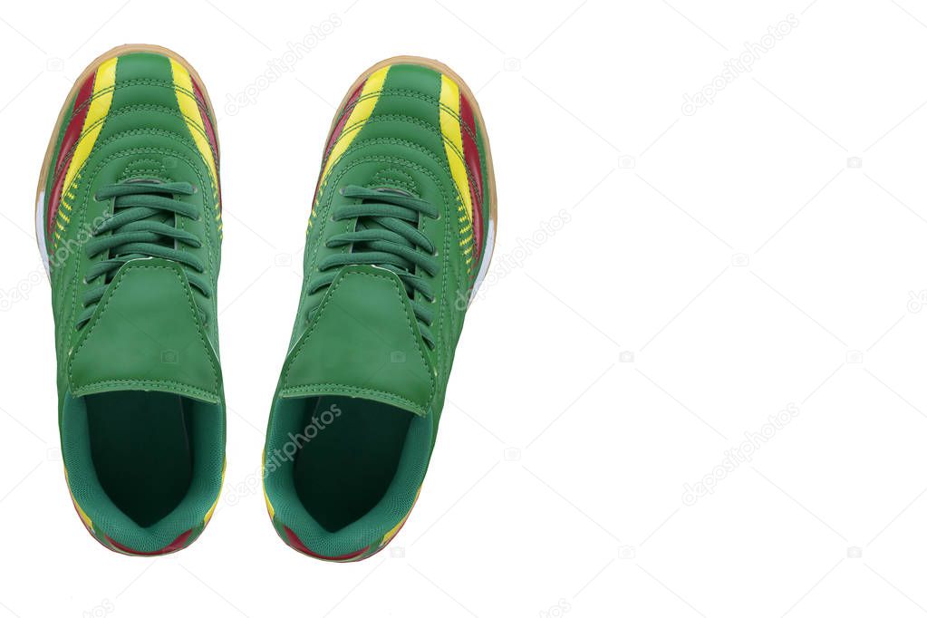 Green sneakers with bright inserts. Sport shoes on white background