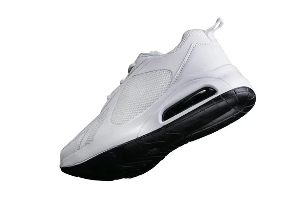 Witte Sneaker Met Zwarte Accenten Geïsoleerd Sportschoenen Een Witte Achtergrond — Stockfoto