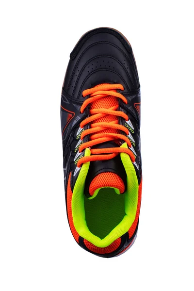 有橙色鞋带和条纹的黑色运动鞋. — 图库照片