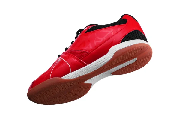 Röda sneakers med svarta snören och vita ränder på en vit bakgrund. — Stockfoto