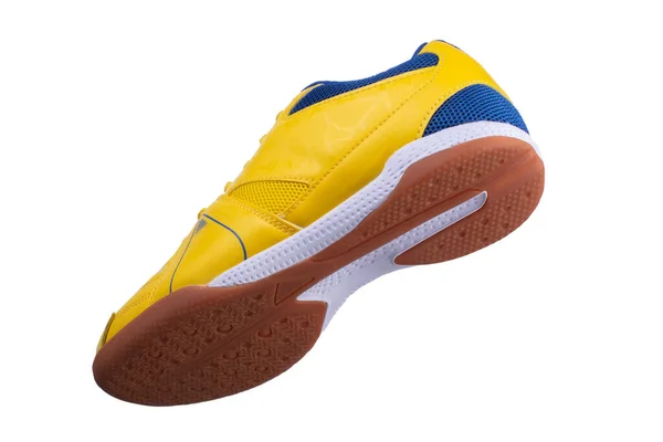 Yellow sneakers with blue accents on a white background. — Stock Photo, Image