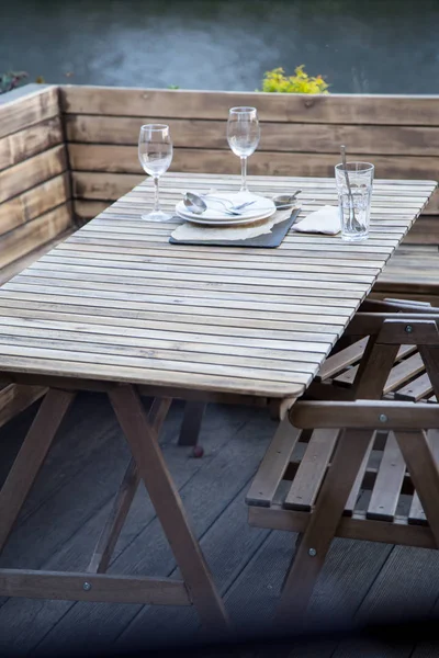 Outdoor restaurant terrace made of wood in scandinavian style