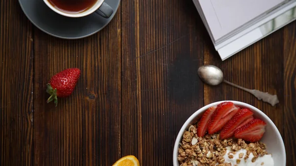 Crunchy Granola Yoghurt Strawberries Bowl Cup Black Coffee Wooden Table — Stock Photo, Image