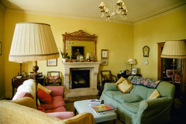 POITIERS, FRANCE - AUGUST 4 , 2018: Living room interior in vintage french style. Cozy atmosphere in old chateau clipart