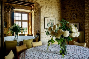 POITIERS, FRANCE - AUGUST 4 , 2018: Dining room interior at french chateau  clipart