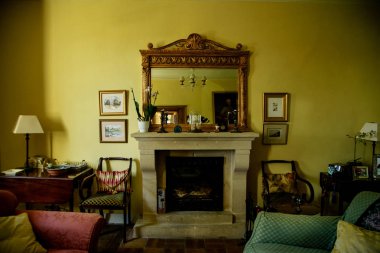 POITIERS, FRANCE - AUGUST 4 , 2018: Living room interior in vintage french style, Cozy atmosphere in old chateau clipart