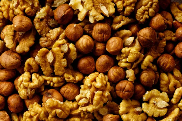 stock image pile of brown raw hazelnuts and walnuts texture, close-up 