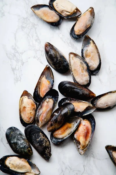 Pile Frozen Mussels White Marble Background Top View — Stock Photo, Image