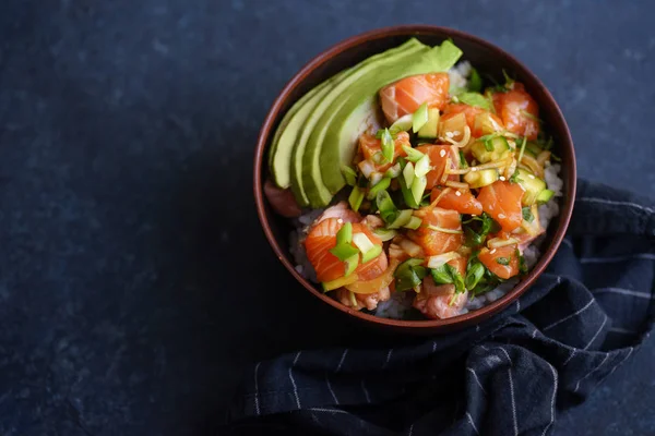 Poke Bowl Raw Marinated Salmon Cucumbers Avocado Dark Blue Concrete — Stock Photo, Image