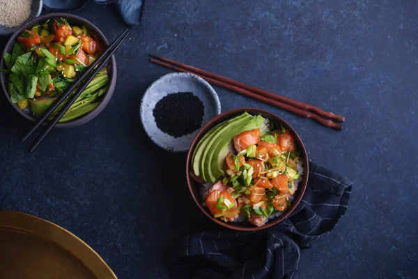 Poke Bowl Raw Marinated Salmon Cucumbers Avocado Dark Blue Concrete — Stock Photo, Image