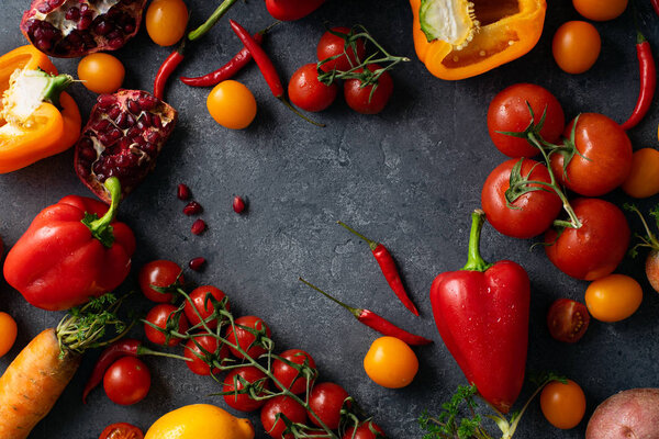 pile of fresh colorful vegetables on concrete grey background, Healthy food ingredients concept