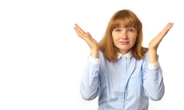 Cute redheaded young woman standing with raised arms and looking perplexed and disappointed isolated on white background   clipart