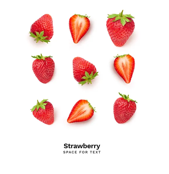 Top view creative pattern with ripe red strawberries isolated on white background, close view