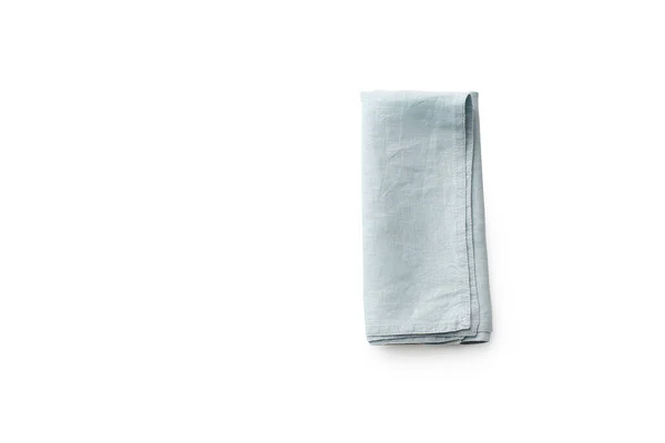 白色背景的折叠式蓝色亚麻布厨房餐巾 — 图库照片