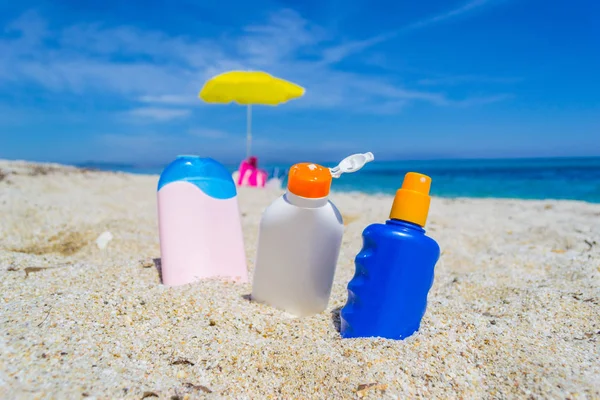 Suntan Lotion Bottles Sand Sardinia Italy — Stock Photo, Image