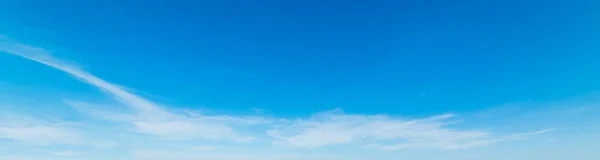 blue sky with white, soft clouds