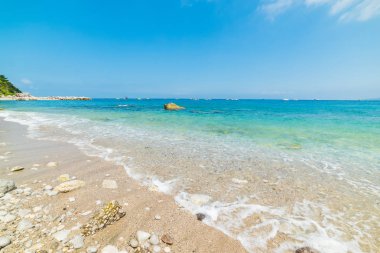 Kum ve çakıl dünya ünlü Marina Grande Beach Capri adasında. Campania, İtalya