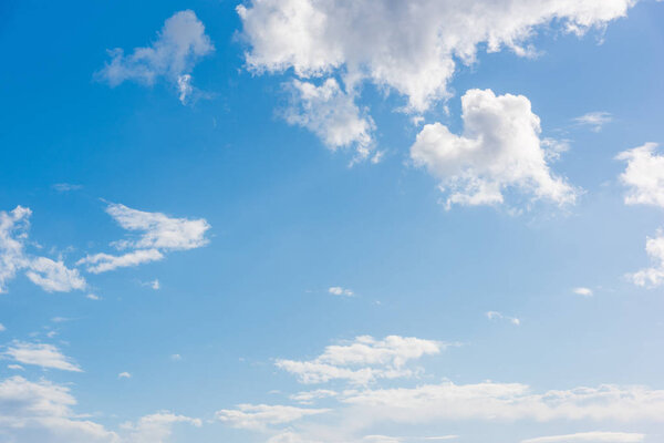 blue sky with white, soft clouds