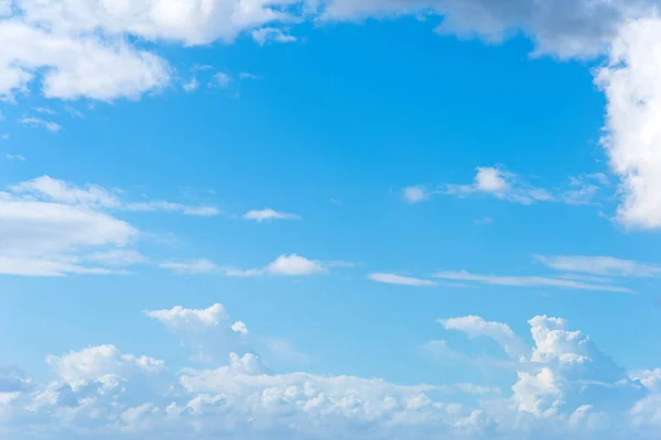 blue sky with white, soft clouds