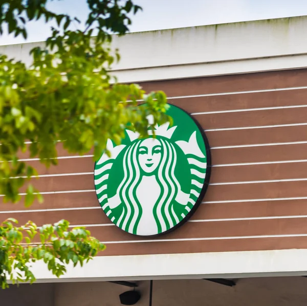 Starbucks loja assinar em Miami — Fotografia de Stock