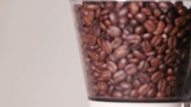coffee beans in a coffee grinder, stop motion