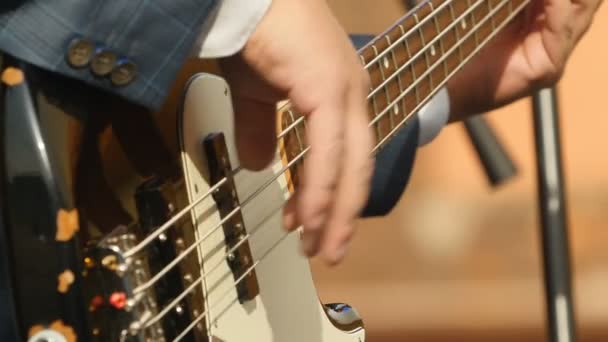 Hand Musician Playing Bass Guitar Close — Stock Video