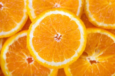 Portakal dilimli narenciye ile soyut bir arka plan. Yakın plan.