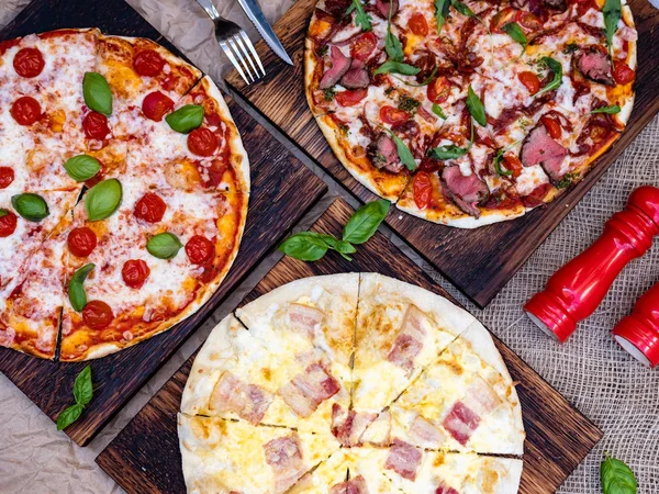 Three Pizzas Picture Carbonara Pizza Creamy Sauce Slices Bacon Wooden — Stock Photo, Image