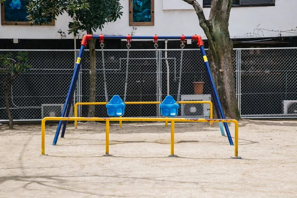 Swings on playground in Osaka, Japan