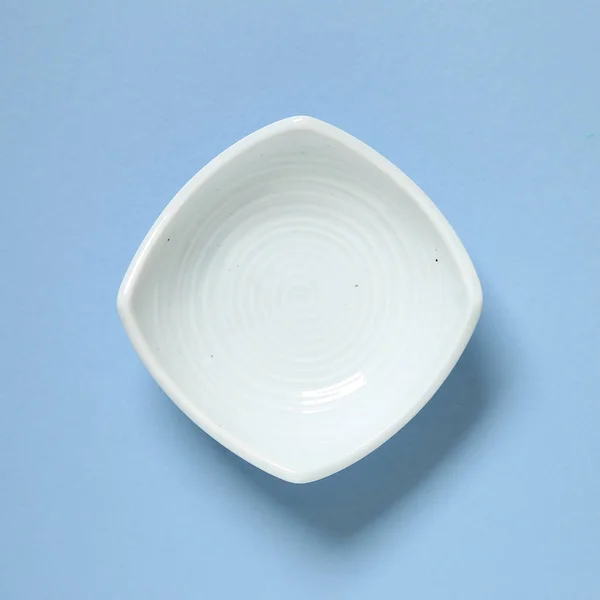 Light Blue Dish Isolated Blue Background — Stock Photo, Image