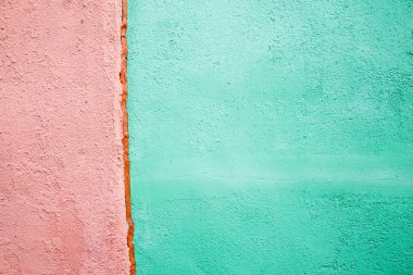 Pembe ve yeşil renkli duvar doku arka planı