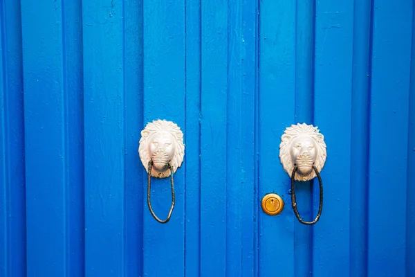 Blue color metal door and knob background