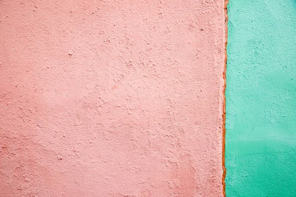 Pink and green color wall texture background
