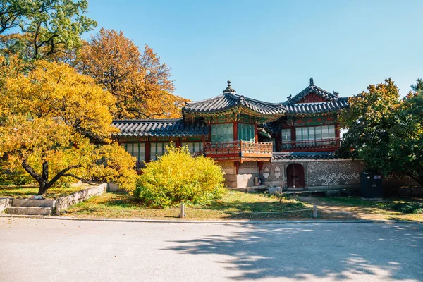 Changdeokgung Palace with autumn maple in Seoul, Korea
