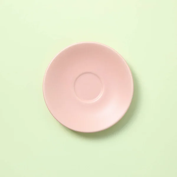 Ροζ Κεραμικό Πιάτο Που Απομονώνονται Πράσινο Φόντο — Φωτογραφία Αρχείου