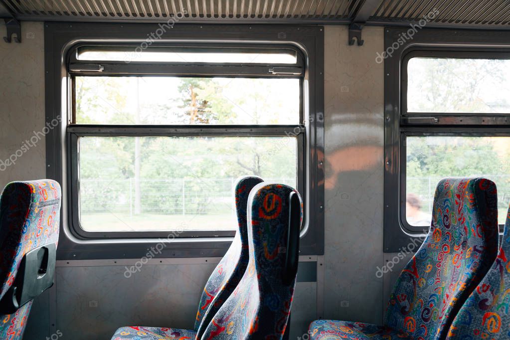 Inside of train with empty seats in Latvia