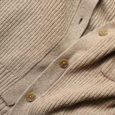 Samimi örülmüş hırka desenli arka plan. Sonbahar kış konsepti