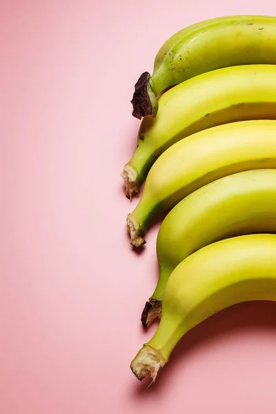 bananas on a pink background. Fashion photo of bananas on the background, beautiful pattern