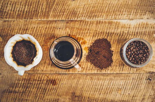 Drip coffee make a cup of coffee On the wood background