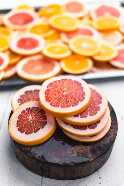 Sliced Grapefruit White Wood Background Studio — Stock Photo, Image