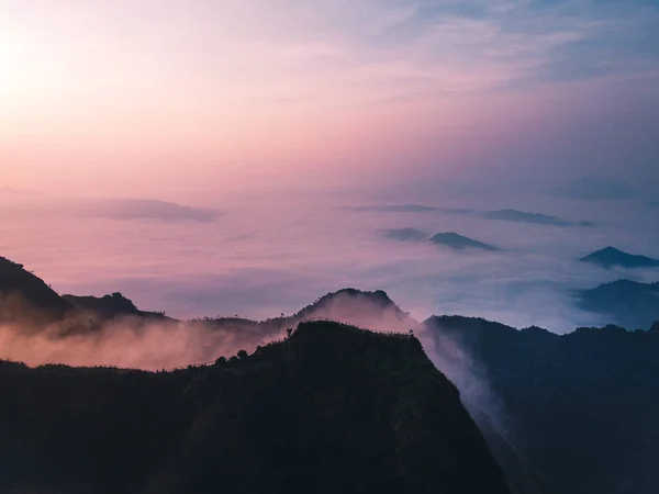 Fog and mountain view Mountains and fog in the morning landscape Blue purple