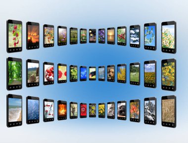 Sıraya dizilmiş farklı resimli akıllı telefonlar. Doğanın görüntüleri olan cep telefonları. Modern iletişim. Dijital teknolojiler. Akıllı telefonlar izole edildi