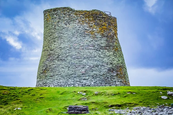 Mousa Broch is the finest preserved example of an Iron Age broch or round tower. It is in the small island of Mousa in Shetland, Scotland. It is the tallest broch still standing and amongst the best-preserved prehistoric buildings in Europe.