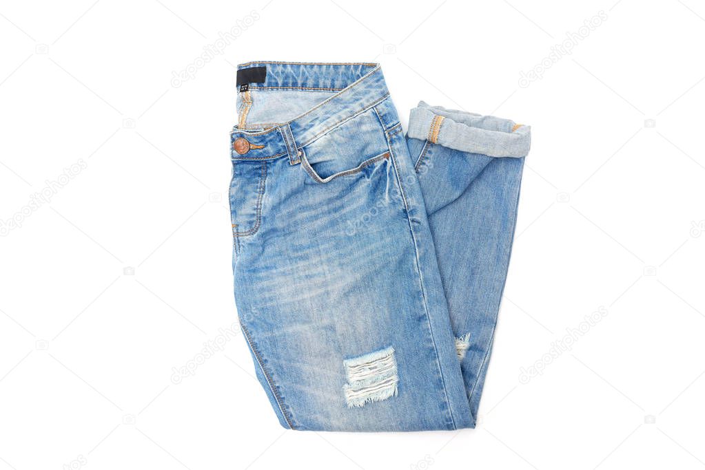 Blue boyfriend jeans isolated on white background flat lay