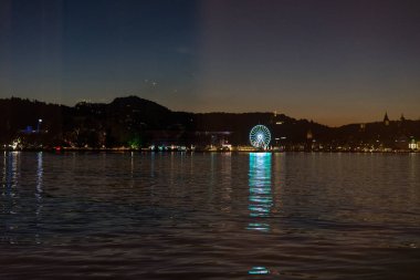 gün batımı tekne turizm hedef görüntülenen Dört Kanton Gölü üzerinde