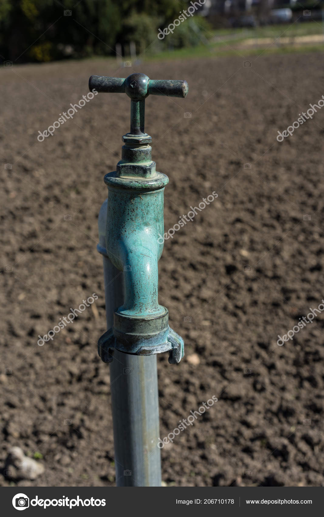 Old Water Pipe Faucet With Nature Brown Earth Background A Old