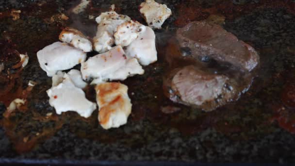 Raw meat cooking on hot stone table grill video — Stock Video