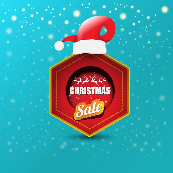 Vector Navidad banner de papel de ventas o etiqueta etiqueta con sombrero de santa rojo sobre fondo azul nevado con la caída de copos de nieve. Invierno rojo venta de Navidad cartel diseño plantilla o fondo — Vector de stock