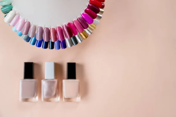 nail samples, big collection of finger nails in various color.Beauty blogger concept.design for nails. testers nail Polish.Fashion manicure. Shiny gel lacquer.Nail art design wheel.Selective focus